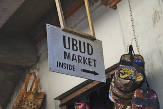 Ubud market sign, some bags and part of the entrance door
