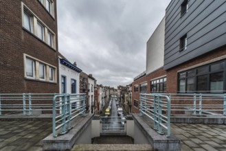 Belgium, 03 15 2019: The symmetric diagonal staircase of the dead end Auguste Snieder street with a