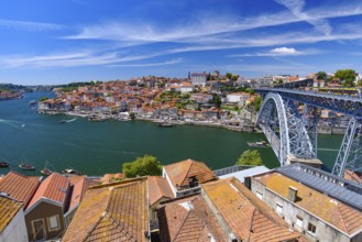 Dom Luis I Bridge, the River Douro, and the Ribeira district in Porto, Portugal, Europe