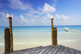 Holbox tropical Island wooden pier in Quintana Roo of Mexico