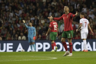Football match, captain Cristiano RONALDO CR7 Portugal right with raised arms and looking to the