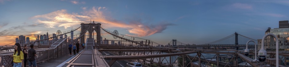 Night coming over famous Brooklyn Bridge, New York City, USA, North America