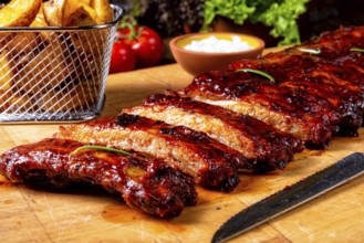BBQ spare ribs from a charcoal grill