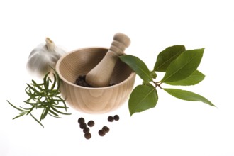 Mortar and pestle, with fresh-picked herbs
