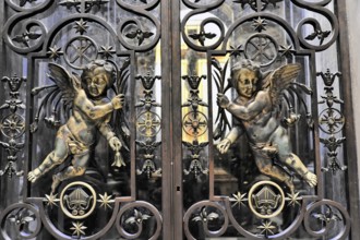 St Peter's Basilica, Vatican, Rome, Italy, metal grille with ornate angels and decorative elements,