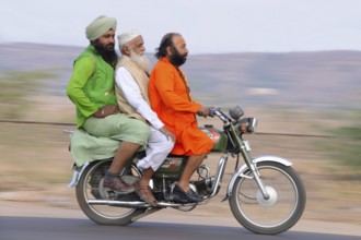 Men on motorbike NOMR