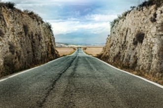 Old dramatic asphalt road