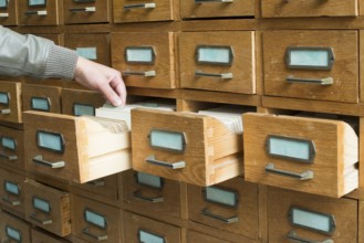 Old archive with wooden drawers