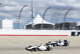 INDY NXT by Firestone Series driver, CHRISTIAN BROOKS (39) (R) of Santa Clarita, California races