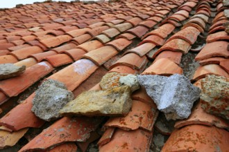 Aged old red clay arabic roof tiles, traditional architecture roofing in Spain