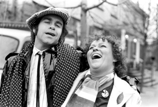 Elton John. English singer, songwriter born march 25 1947. Pictured wearing a chequered cap and a
