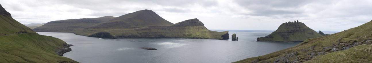 Panorama of Vagar and Tindholmur on the Faroe Islands with salmon farm, Faroe Islands, Denmark,