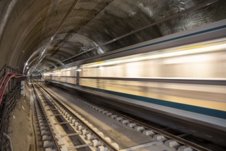 Subway tunnel rail tracks. Long exposure. Blurred lights