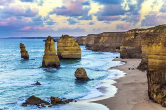 Early morning on the ocean coast. The clouds over the well-known rocks Twelve apostles. Travel to