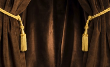 Brown theatre curtain and yellow tassels