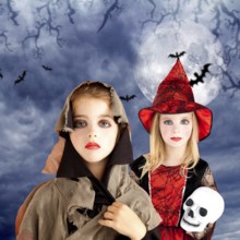 Halloween kid girls with skull cloudy moon and bat sky