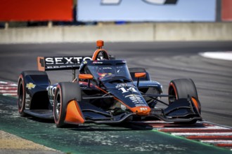 SANTINO FERRUCCI (14) of Woodbury, Connecticut practices for the Firestone Grand Prix of Monterey