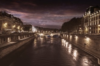 Paris Seine river sunset in France at Saint Michel