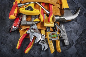 Tool Belt With Construction Tools On Black Background