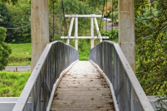 Redwood Bridge is a 34 meter suspension footbridge across the Yarra River, Warburton, Victoria,