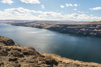 The huge Columbia river in Washington state, dry landscape surrounding the water, USA, North