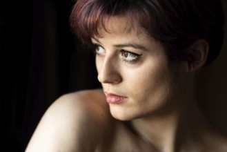 Fashion portrait of a 23 year old white woman with short, dyed hair, Brussels, Belgium, Europe