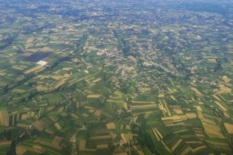 Aerial View of green fields, forest countryside