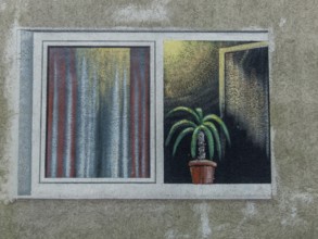 A balcony was painted on a house with colour. Three-dimensional painting of a house facade. Austria