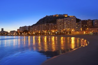 Alicante skyline at sunset from Postiguet beach in spain