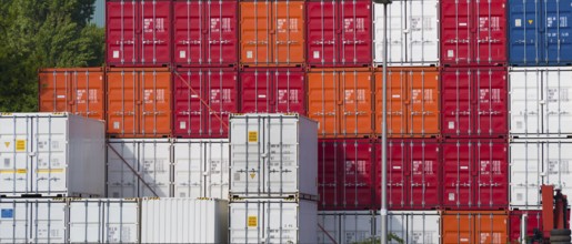 Piled up cargo containers in the Rotterdam harbor area