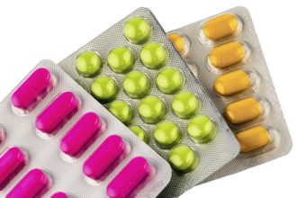 Colourful tablets in blister pack, symbolic photo for remedies and healthcare