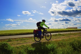 Biker on The Way of Saint James biking in Palencia Spain