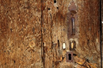 Aged wood door grunge texture rusty handle vintage wooden detail
