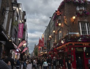 Ireland, Dublin, June 20 2022: People outside the famous Irish pub The Temple Bar in the centre of