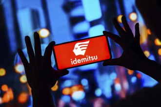 In this photo illustration, the Idemitsu Kosan Company logo is seen displayed on a smartphone