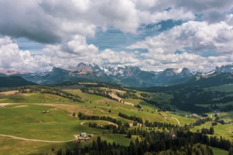Panoramic view from the Seiser Alm to the Dolomites in Italy, drone shot
