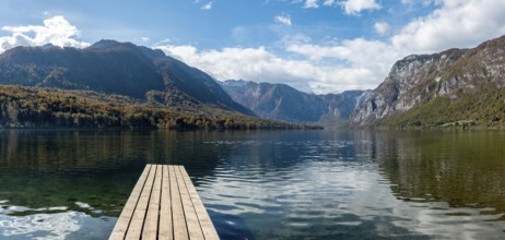 Scenic view of a small wooden jetty at lake Bohinj in the Triglav National Park, The Julian Alps,