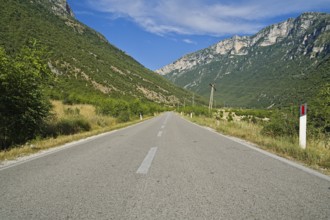 Vjosa river valley main road to the city of Permet during summer without any cars driving