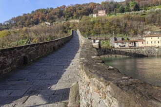 Picturesque stone bridge built a thousand years ago. Devil's Bridge over the Sercchio River. Cold