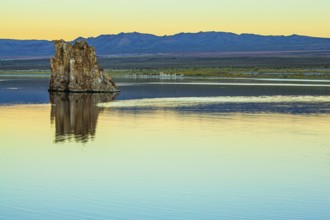 Magic reflections of tuff outliers in lake water. Lime-tuff towers of bizarre shapes rise from the