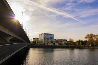 Modern Building and a Bridge over River Aare with Sunbeam in a Sunny Autumn Day in Solothurn,