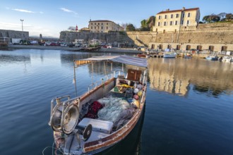 Small traditional fishing boat in Port Tino Rossi, the fishing and pleasure boat harbour near the