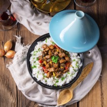Tajin beef stew with rice, peppers and sesame seeds