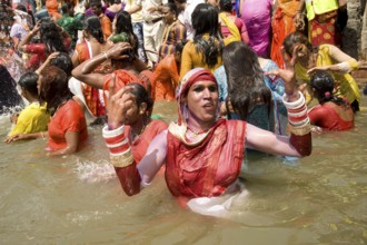 Transgender bathing in kshipra river, madhya pradesh, india, asia