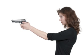 Beautiful woman with a loaded handgun pistol
