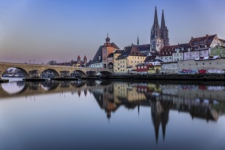 View over the Danube to the Regensburg Cathedral and the Stone Bridge in Regensburg, Bavaria,