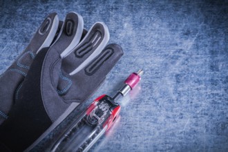 Muunction toolset fabric safety gloves on metallic background