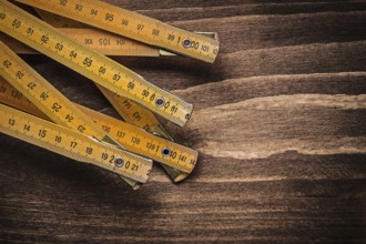 Wooden meter on wood board horizontal version construction concept