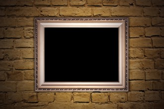 Vintage brown textured brick wall with a frame