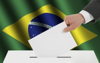 The Brazilian flag and the hand with the bulletin about the ballot box